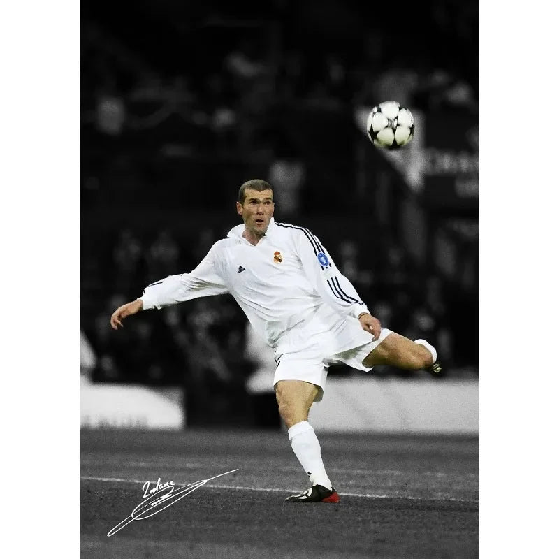 Black and white photo of a soccer player kicking a ball during a match