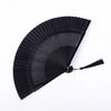 Black traditional Chinese folding fan with a pleated design.