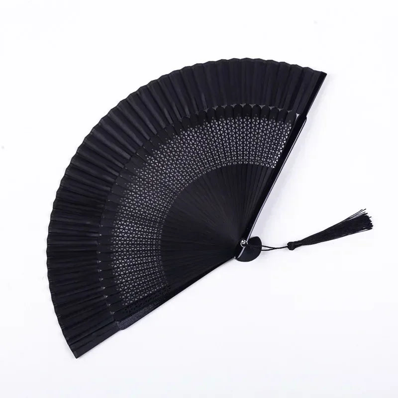 Black traditional Chinese folding fan with a pleated design.