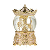 Adorno de caja musical de bola de cristal decorativo con metal dorado y cúpula de vidrio transparente.