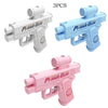 Three versions of a prank gun water gun in white, blue, and pink colors.