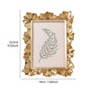 A golden 3D daisy resin photo frame with a light pink background and a green fern design.