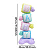 A stack of letter foil balloons spelling BABY with a question mark shape and a purple balloon base