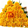 A bouquet of bright yellow velvet touch artificial roses for weddings and home decor.