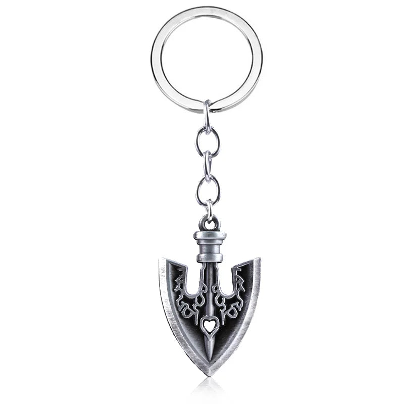 Silver arrow metal keychain featuring a stylized trident design