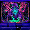 A dark tapestry featuring a bearded wizard figure surrounded by vibrant, glowing neon-like patterns and jellyfish motifs.