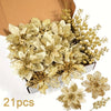 A bouquet of artificial gold and cream berries and flowers displayed in a cardboard box.