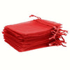 A stack of red organza drawstring bags for gifts, weddings, and parties.