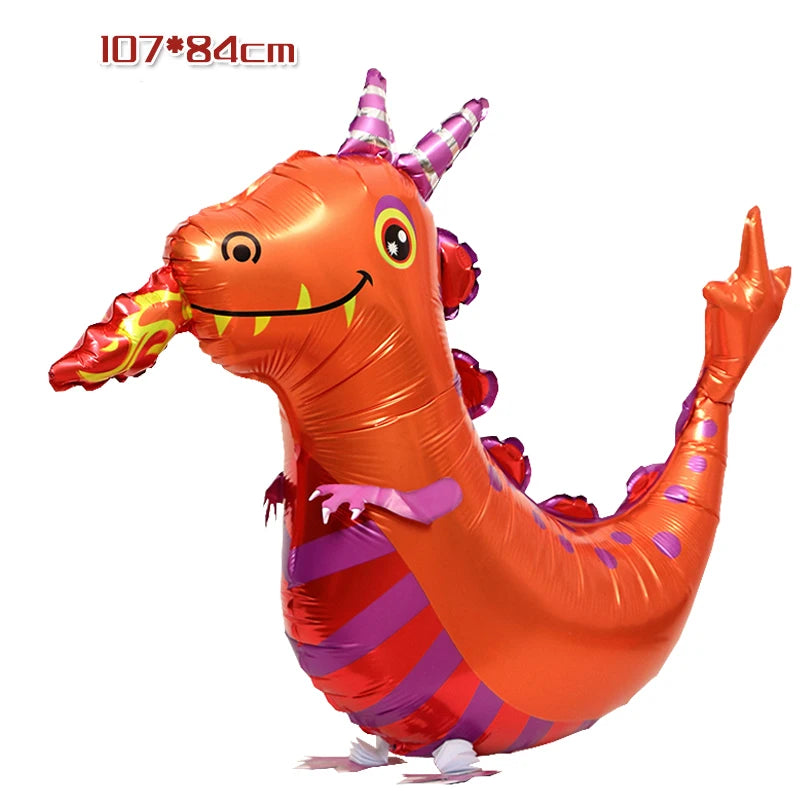 An orange cartoon dragon foil balloon with purple horns and a smiling face.