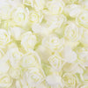 A close-up of a bulk pack of realistic white foam rose flowers for weddings and events.