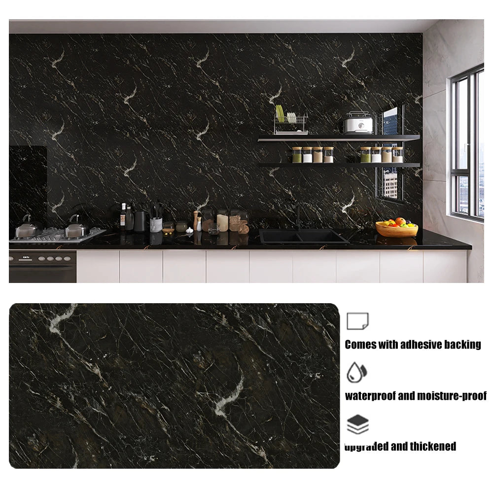 A dark marble pattern self-adhesive backsplash panel installed on a kitchen wall with various accessories.