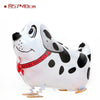 A white and black cartoon cow foil balloon shaped like a farm animal for birthday party decor