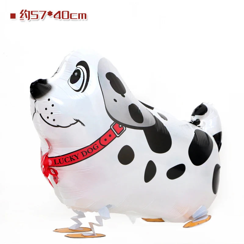 A white and black cartoon cow foil balloon shaped like a farm animal for birthday party decor