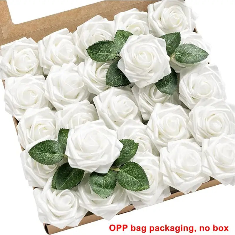 A bouquet of white foam rose flowers with green leaves packaged in a cardboard box.
