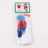 A clear plastic bag containing a red and yellow whistling balloon helicopter toy with various parts.
