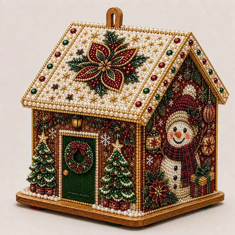 A detailed diamond painting kit depicting a rustic Christmas cabin with a decorated roof and festive scene.
