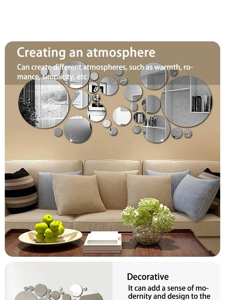 A wall decor set featuring various round acrylic mirrors in silver and gold tones displayed above a beige sofa.