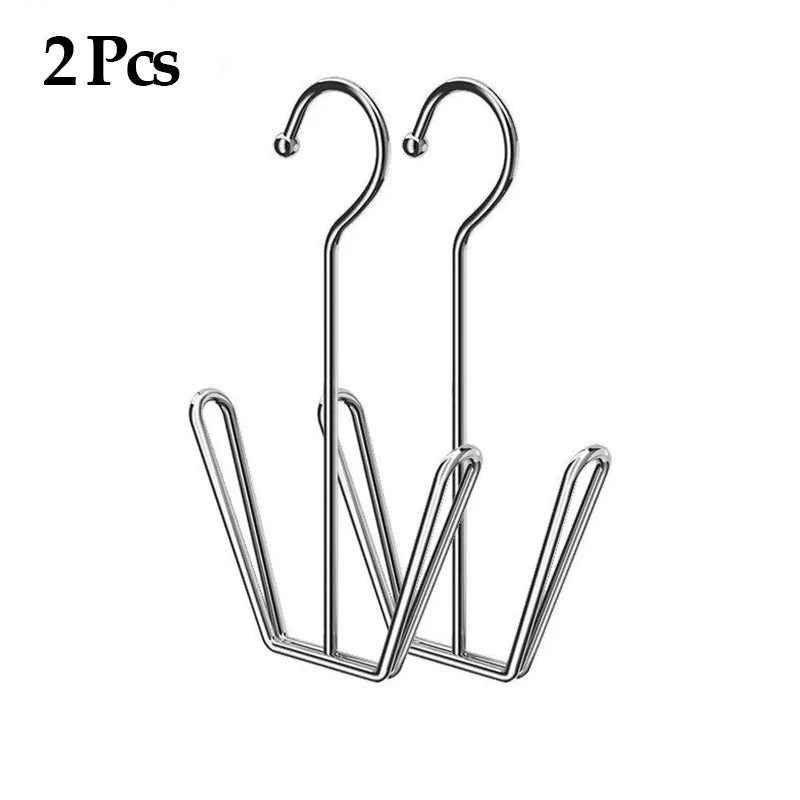 Two stainless steel hanging shoe organizers with double hooks.