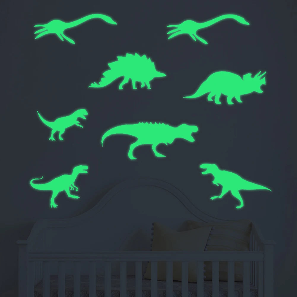 Green glow in the dark dinosaur wall decals displayed above a white crib.