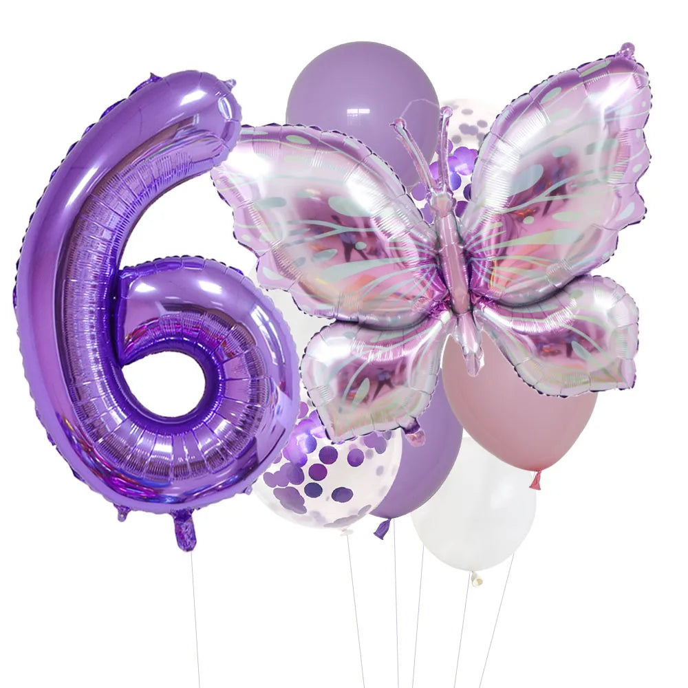 A set of purple foil balloons shaped like the number six and a butterfly