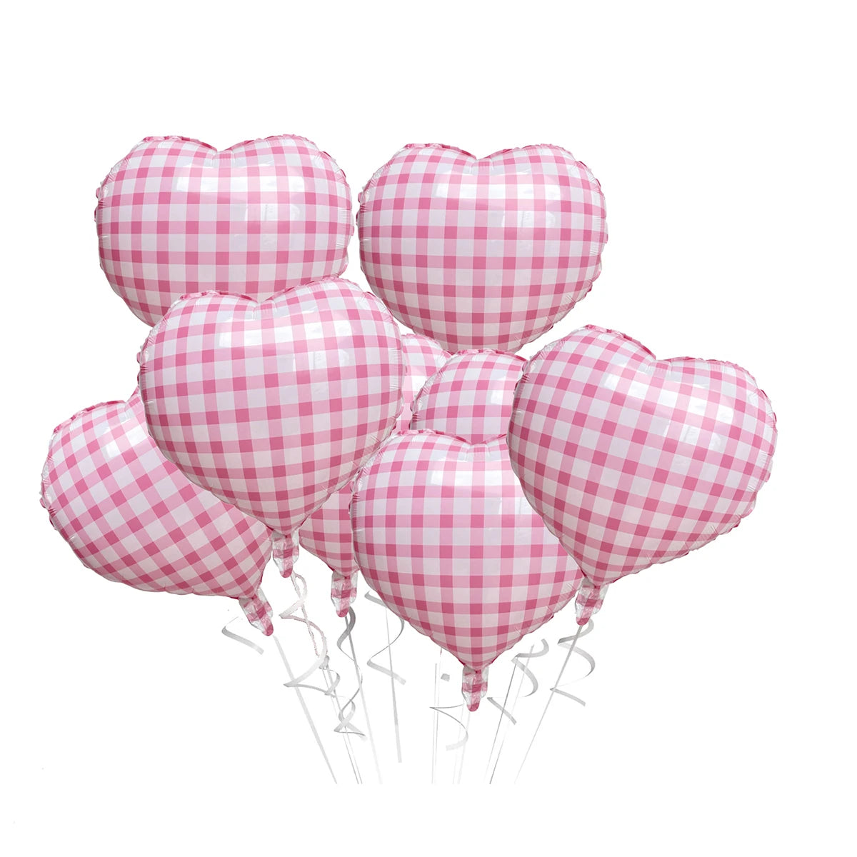 A bunch of pink and white checkered heart-shaped foil balloons tied together with strings.