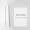 A white wooden art frame is displayed on a white wall, showing its dimensions.