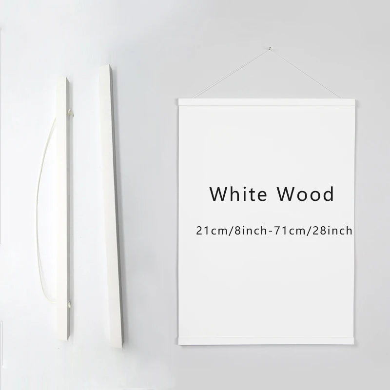 A white wooden art frame is displayed on a white wall, showing its dimensions.