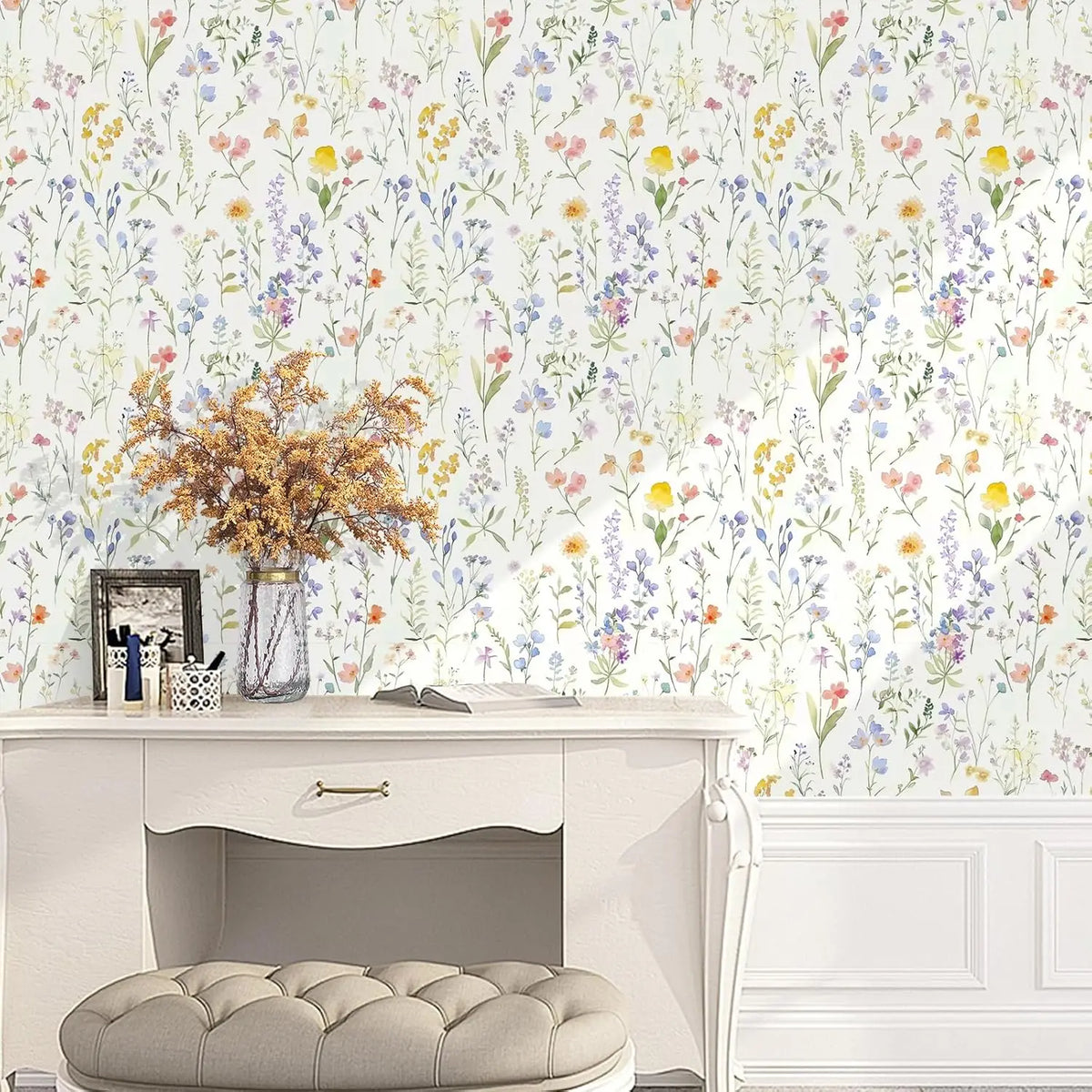 Boho floral peel and stick wallpaper featuring a dense mix of colorful wildflowers on a white background.