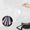 A hand is applying a clear oil-proof self-adhesive film to a glass surface, demonstrating its protective function.