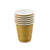 A stack of five disposable gold-colored shot glasses with white lids.