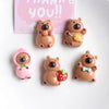 A set of adorable brown and pink guinea pig refrigerator magnets featuring various expressions and accessories.