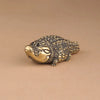 Antique brass crocodile figurine with detailed texture, used as vintage desk decor.
