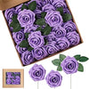 A box filled with purple artificial foam roses and several loose purple roses on green leaves.