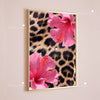 Pink leopard hibiscus flower canvas wall art in a gold frame