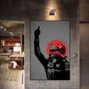 A canvas wall art print depicting a person with a raised fist wearing a motorcycle helmet illuminated by neon red light.