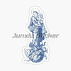 A sticker featuring a depiction of Mary and the infant Jesus, likely for Catholic devotion.