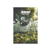 A white van is parked in a wooded area with a sign above it that reads Blond Frank Ocean.