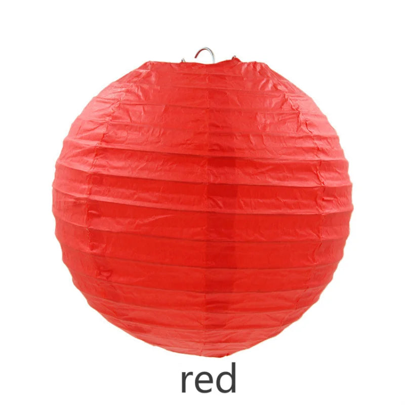 A round, bright red decorative paper lantern.