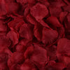 Deep red silk rose petals scattered for weddings, parties, and home decor