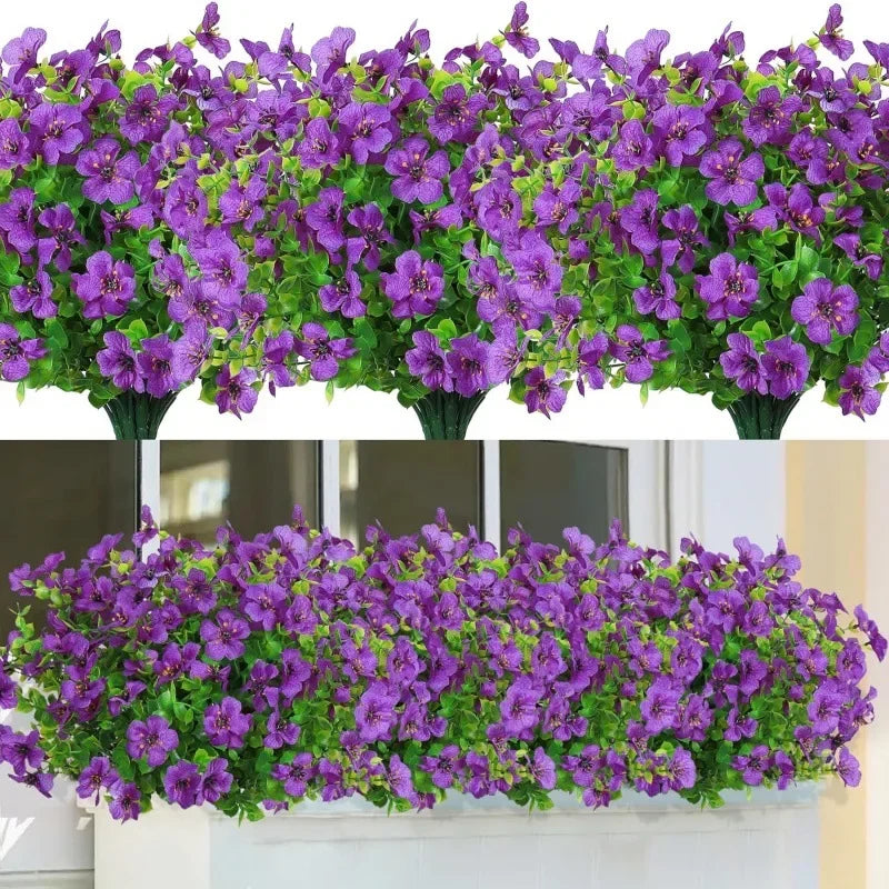 A dense arrangement of purple and pink artificial flowers in green foliage displayed in a vase.