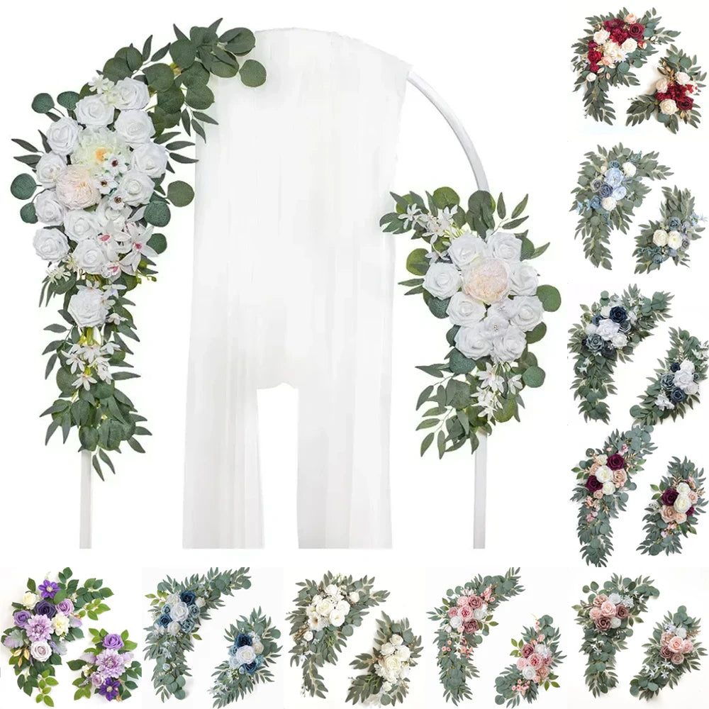 A wedding arch decoration featuring dusty rose and blue flowers and eucalyptus greenery.