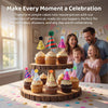 A collection of whimsical, ready-to-use mini birthday cake toppers displayed on a wooden platter with children celebrating.