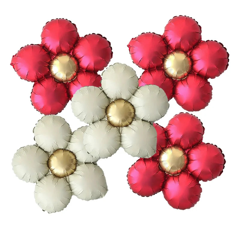 A set of five matte foil balloons in red and pink daisy designs.