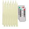 A set of six cream-colored flamless taper candles and a remote control with timer and light settings.