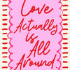 Pink art print with red script text that reads Love Actually is All Around