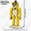 A yellow building block model of a character, measuring 18.3cm tall.
