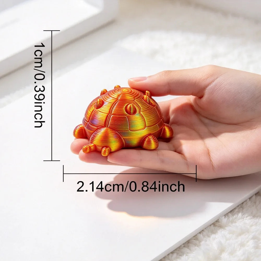A hand holds an orange, textured 3D printed animal figurine with a scale ruler for size reference.