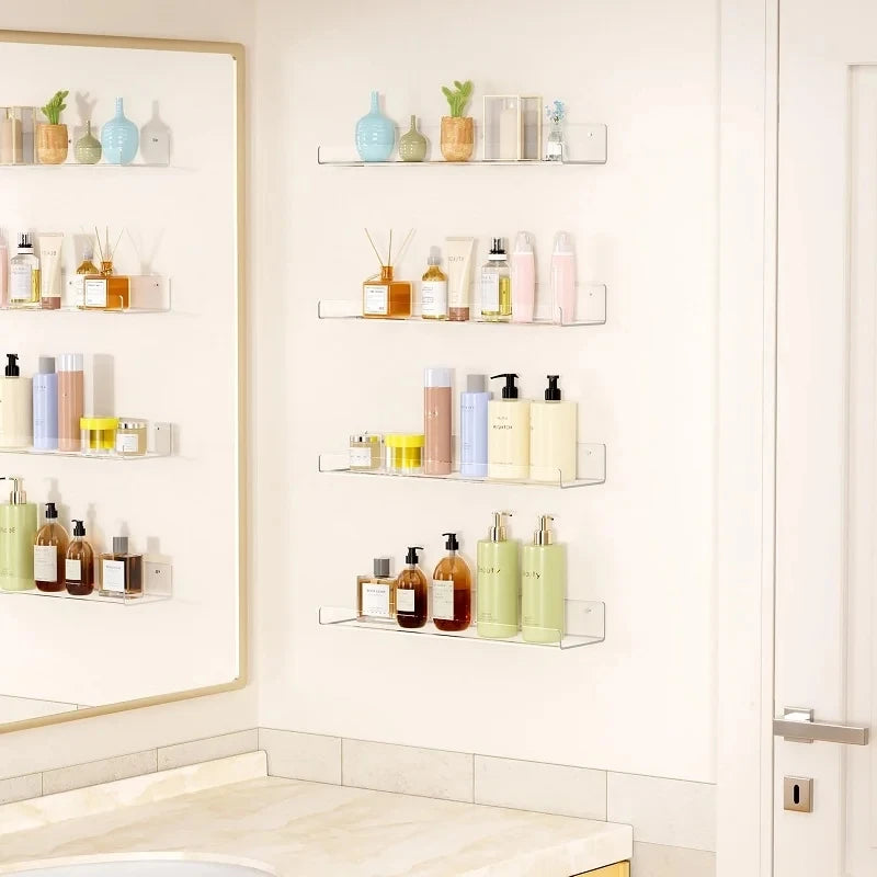 Clear acrylic floating shelves display various skincare products on a white wall.