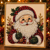A framed picture of a bearded Santa face made with white pearls and festive red greenery.
