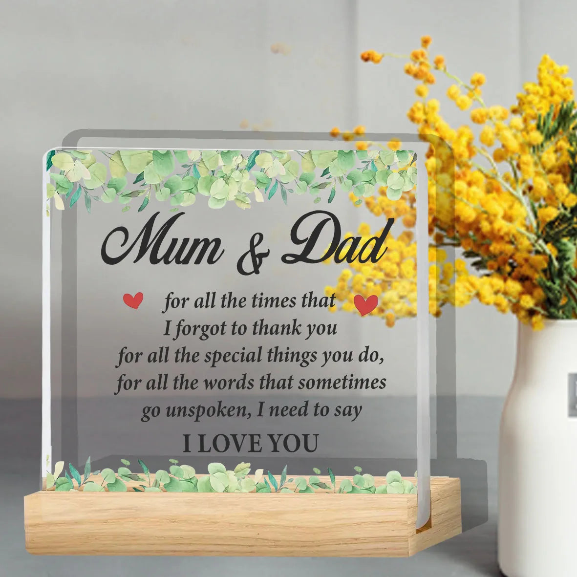 Clear acrylic plaque with a floral wreath design and the text Mum & Dad for parents